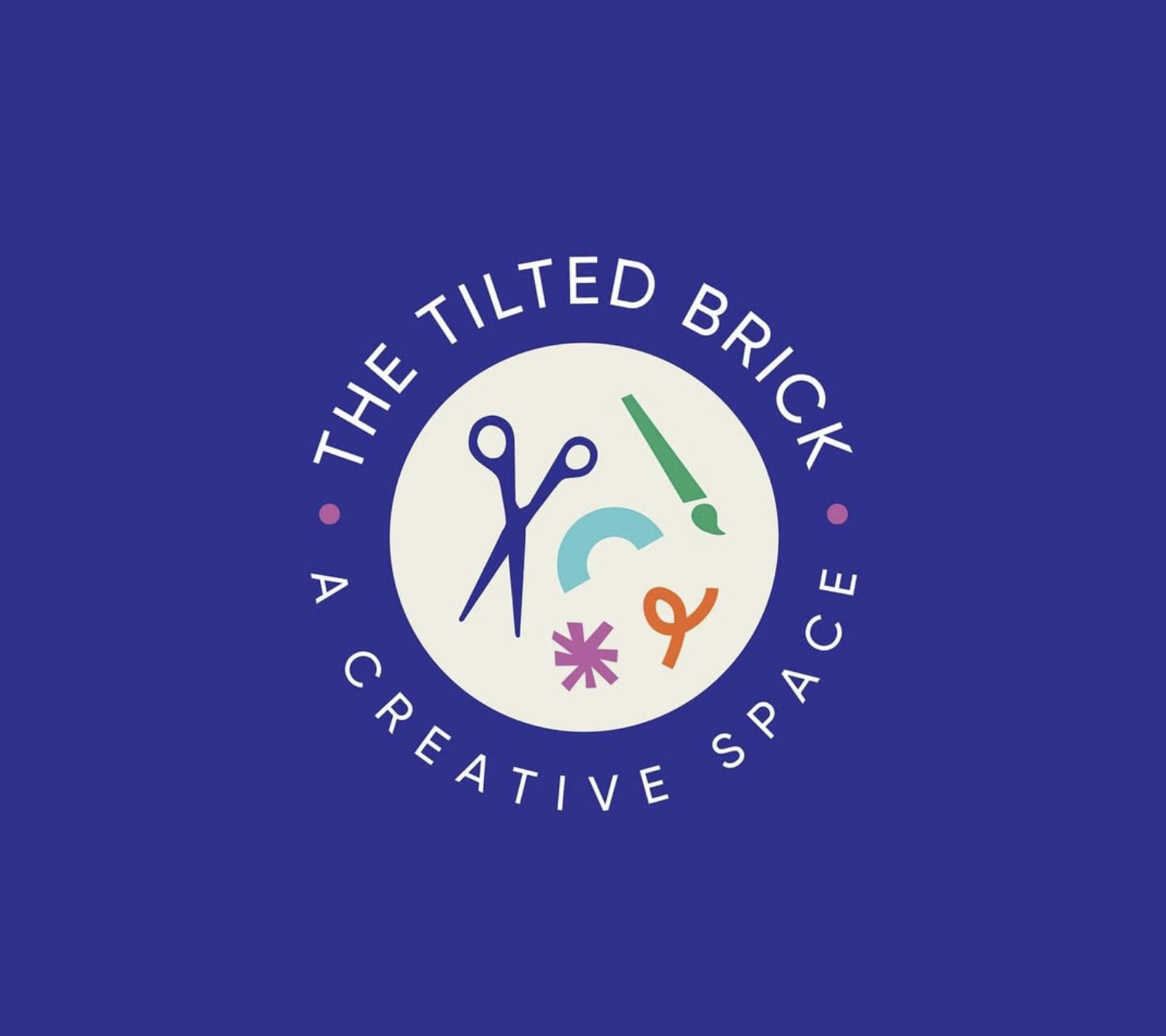 The Tilted Brick, A Creative Space circular logo with scissors, brush and shapes