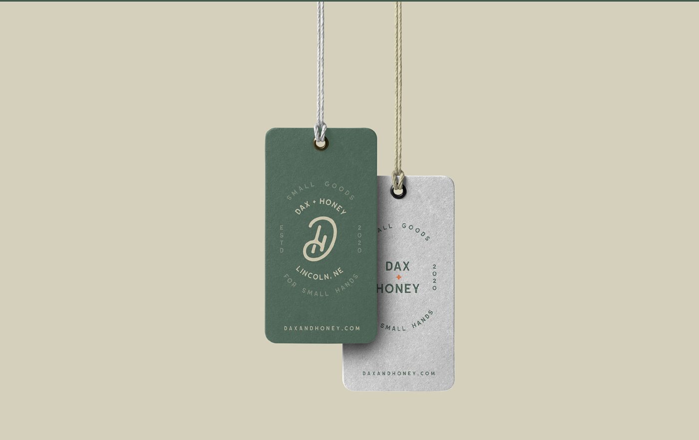 Dax + Honey Branding: Hang tags in printed board and stamped metal